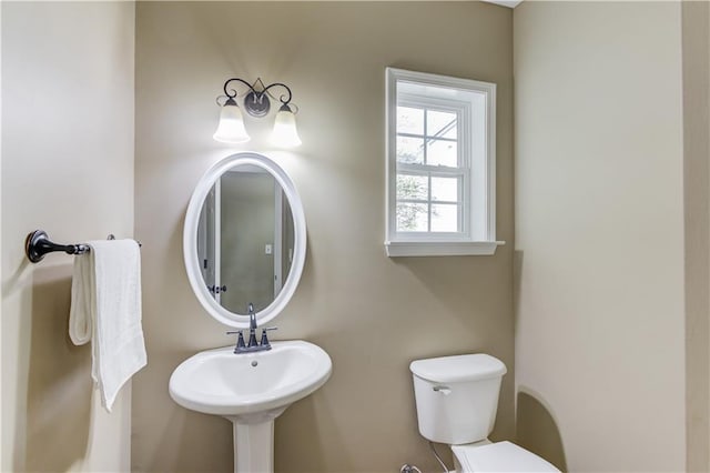 5115 Amberden Hall Dr, Suwanee, GA 30024 - half bathroom with toilet and a sink