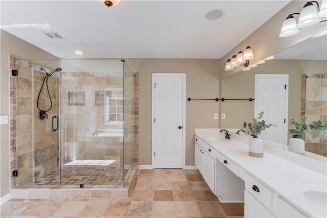 5115 Amberden Hall Dr, Suwanee, GA 30024 - full bathroom featuring double vanity, baseboards, and a stall shower