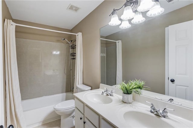 5115 Amberden Hall Dr, Suwanee, GA 30024 - bathroom featuring shower / bath combo with shower curtain, a chandelier, double vanity, and toilet