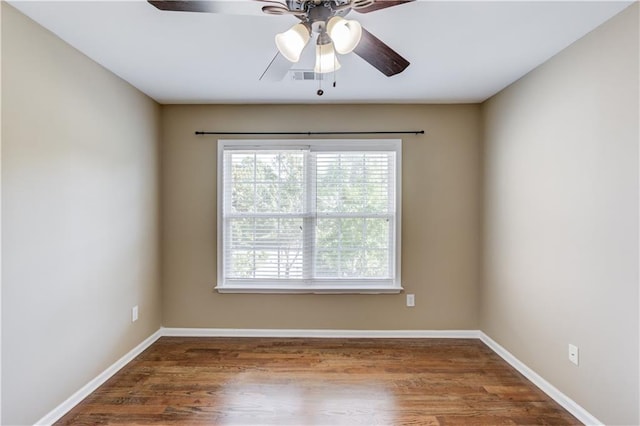 5115 Amberden Hall Dr, Suwanee, GA 30024 - empty room with wood finished floors, baseboards, and ceiling fan