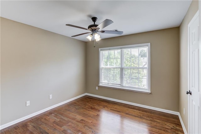 5115 Amberden Hall Dr, Suwanee, GA 30024 - empty room featuring dark wood finished floors, baseboards, and ceiling fan