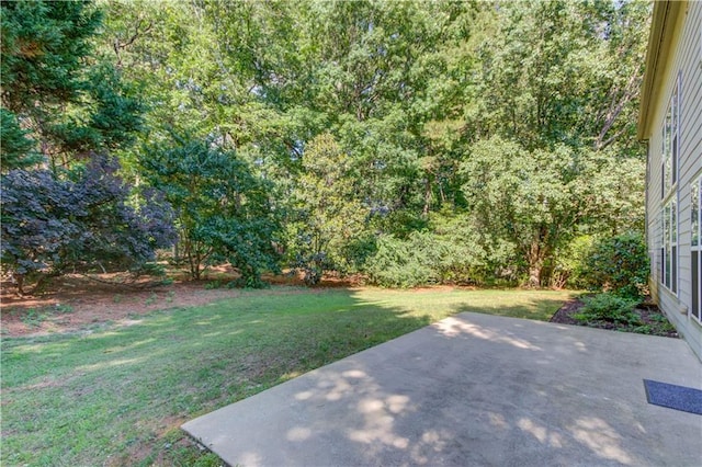 5115 Amberden Hall Dr, Suwanee, GA 30024 - view of grassy yard featuring a patio