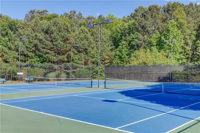 5115 Amberden Hall Dr, Suwanee, GA 30024 - view of tennis court featuring community basketball court and a wooded view