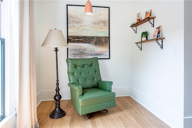 sitting room with wood finished floors