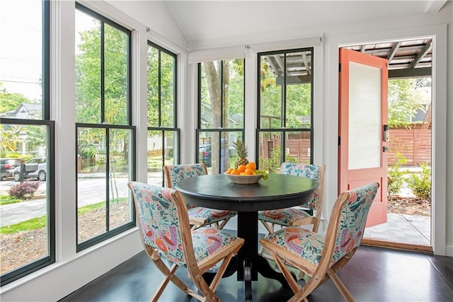 sunroom / solarium with vaulted ceiling