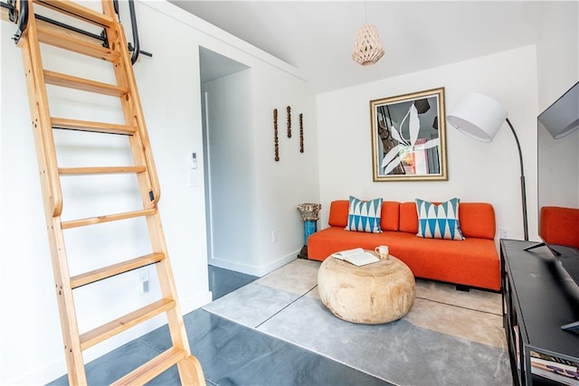 sitting room featuring baseboards