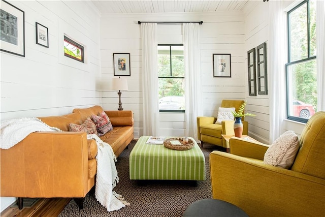 sitting room featuring crown molding