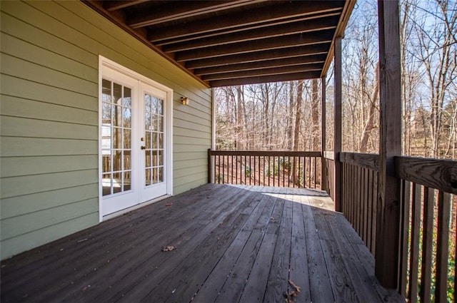 wooden deck featuring french doors