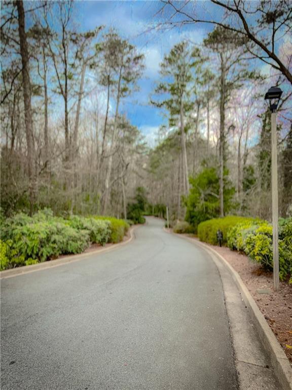 view of road featuring curbs