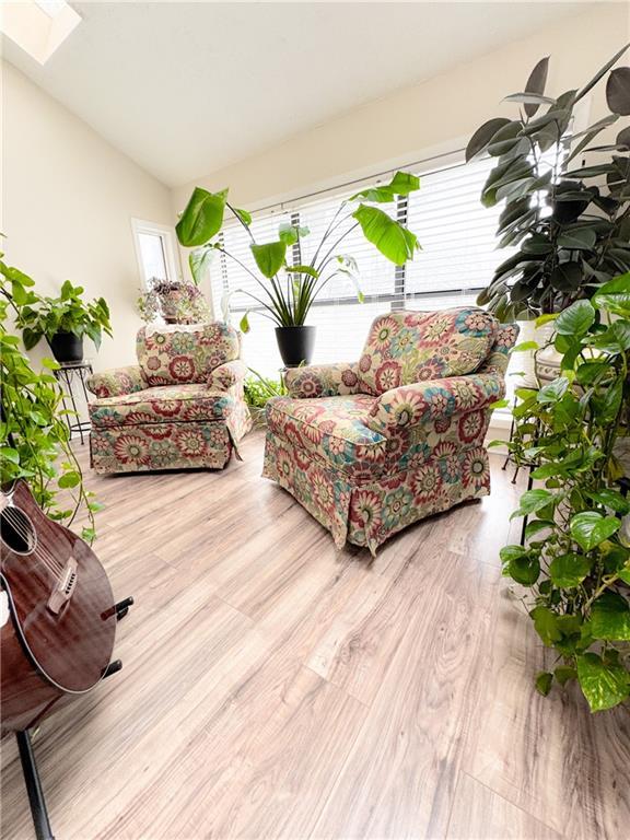 interior space featuring outdoor lounge area and a wooden deck