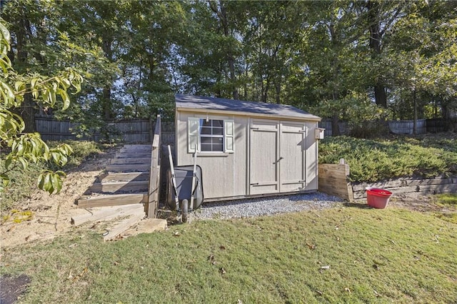 view of outdoor structure featuring a yard