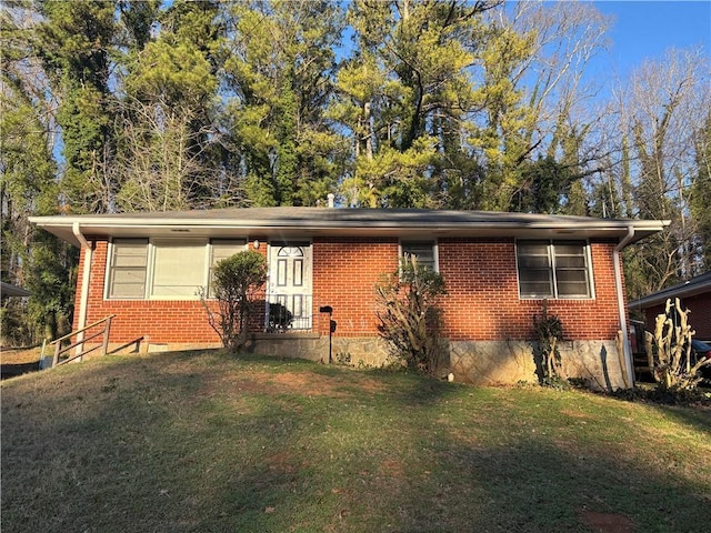 view of front of house with a front lawn