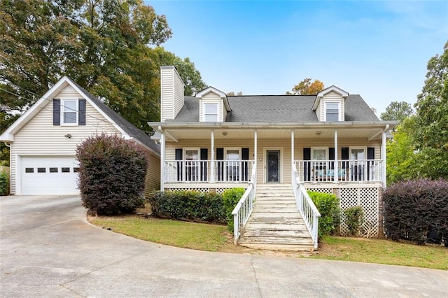 cape cod home featuring a garage and a porch