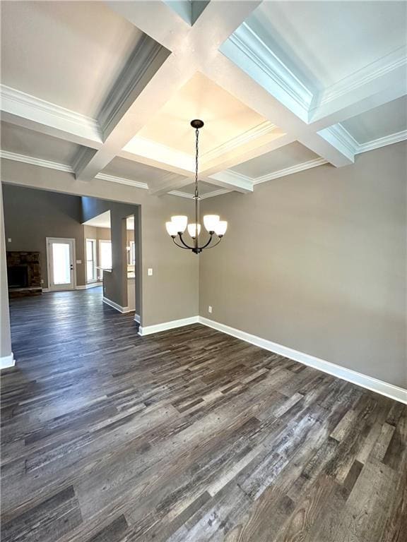 unfurnished dining area with a chandelier, beamed ceiling, dark wood finished floors, and baseboards