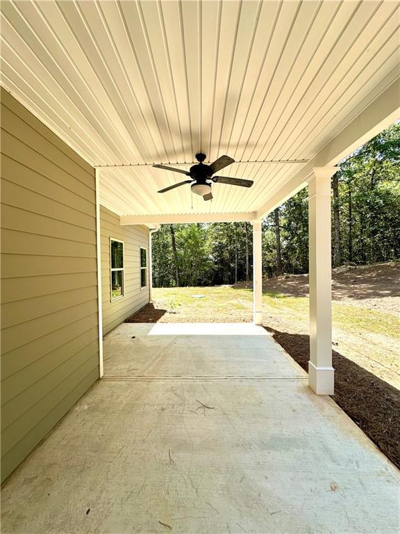 view of patio / terrace featuring ceiling fan