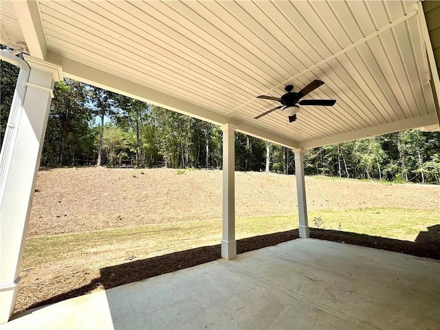 view of patio featuring ceiling fan