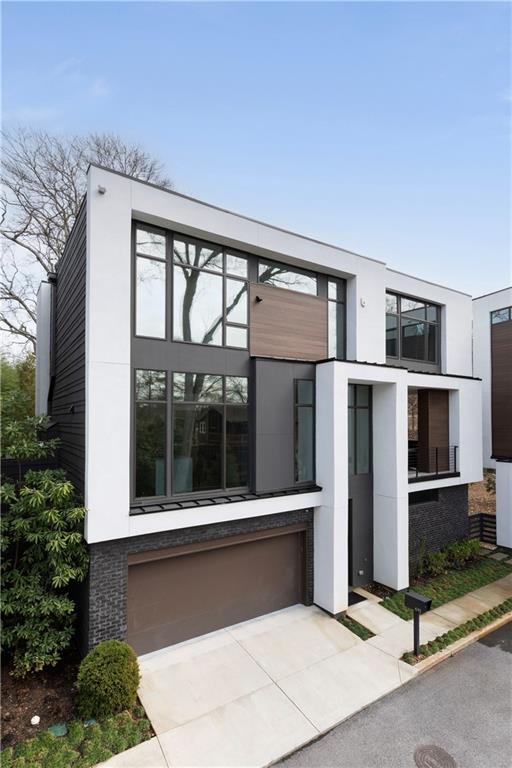 modern home featuring a garage