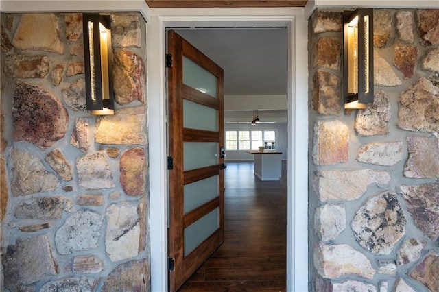 hallway with dark wood-type flooring