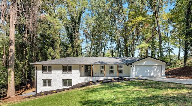 ranch-style house with a garage and a front yard