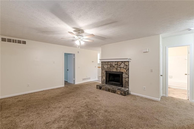 laundry room with hookup for an electric dryer, washer hookup, a textured ceiling, and light tile patterned flooring