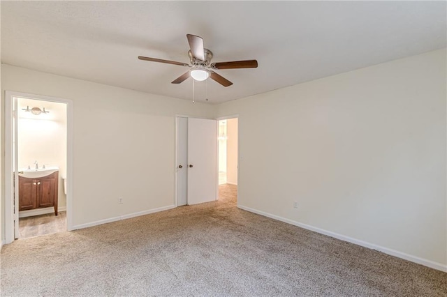 unfurnished room with a textured ceiling, carpet floors, and ceiling fan