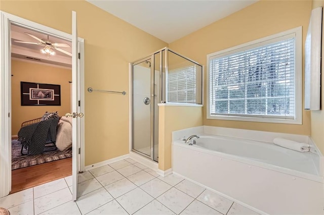 bathroom with tile patterned flooring, separate shower and tub, plenty of natural light, and ceiling fan