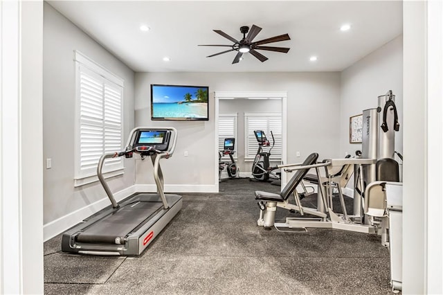 workout area featuring a ceiling fan, recessed lighting, baseboards, and a healthy amount of sunlight