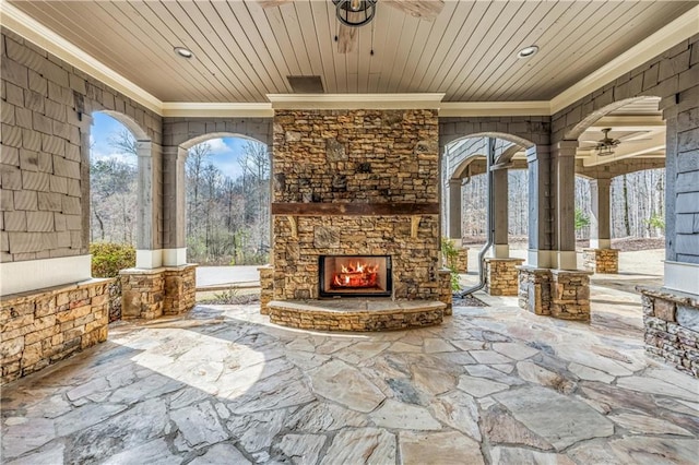 view of patio / terrace with an outdoor stone fireplace