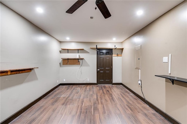 interior space featuring ceiling fan, recessed lighting, wood finished floors, and baseboards