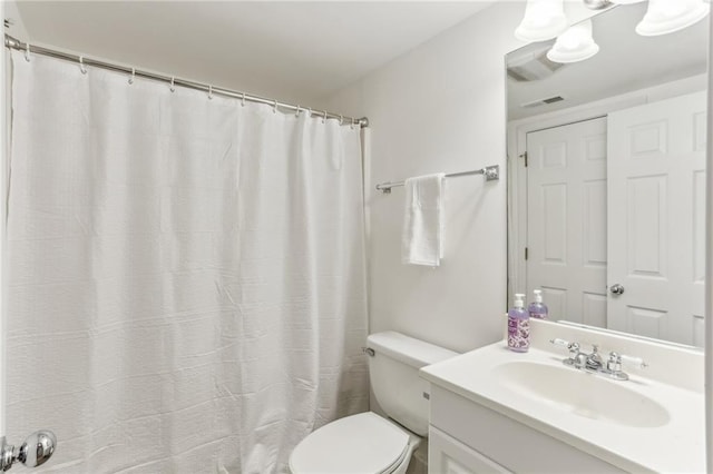 869 Briarcliff Rd NE Unit B25, Atlanta, GA 30306 - bathroom with visible vents, vanity, and toilet