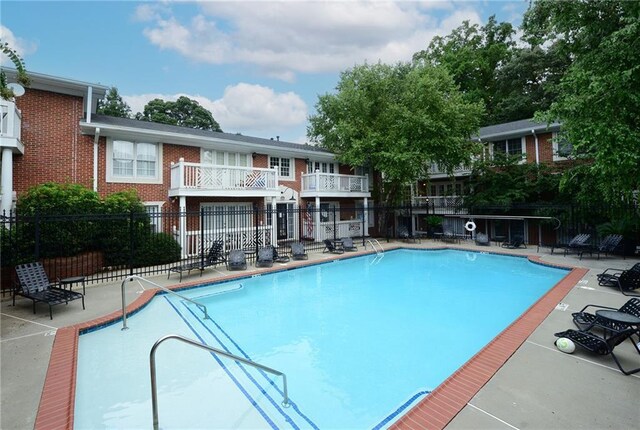 869 Briarcliff Rd NE Unit B25, Atlanta, GA 30306 - community pool featuring fence and a patio