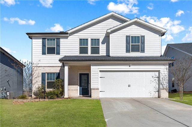 view of front property featuring a garage and a front yard