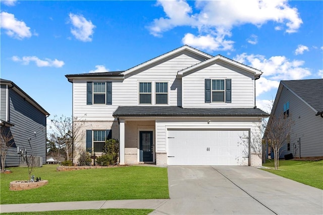 view of front property featuring a garage and a front lawn