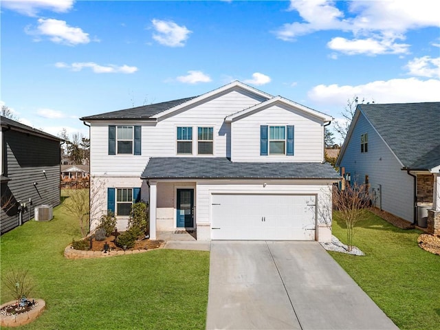 view of property featuring a garage, central AC, and a front lawn