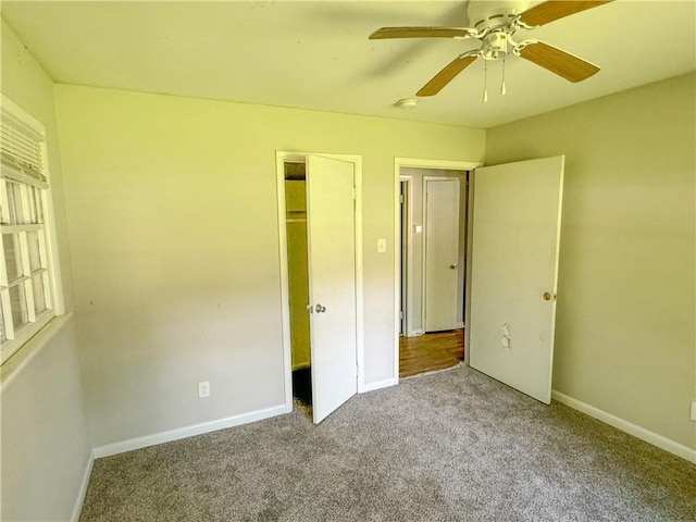 unfurnished bedroom featuring a closet, carpet flooring, and ceiling fan