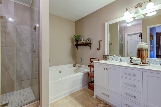 bathroom featuring vanity and separate shower and tub