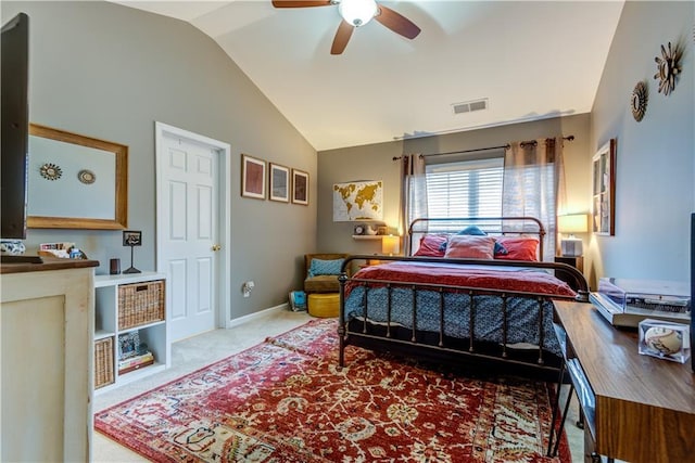 carpeted bedroom with ceiling fan, vaulted ceiling, visible vents, and baseboards