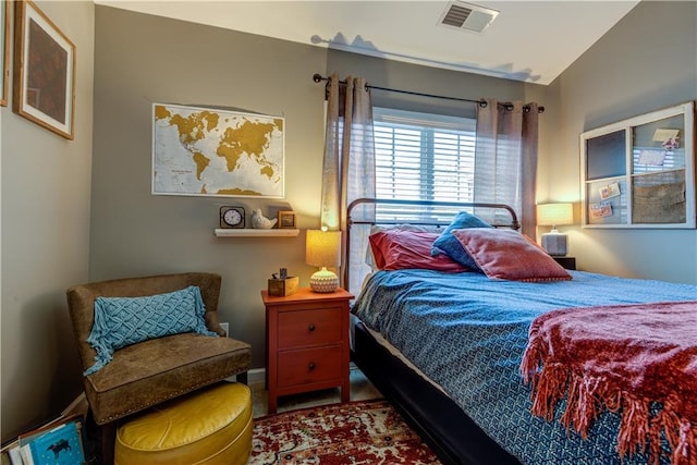 bedroom with vaulted ceiling