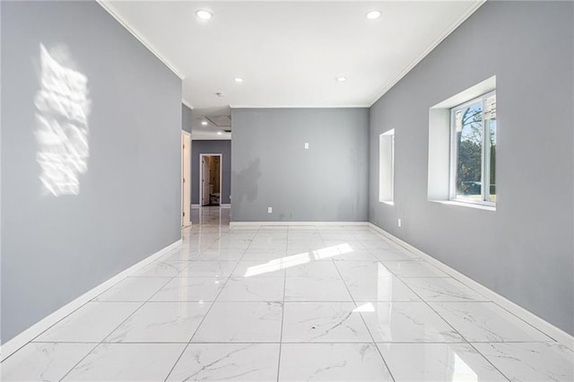 empty room featuring ornamental molding