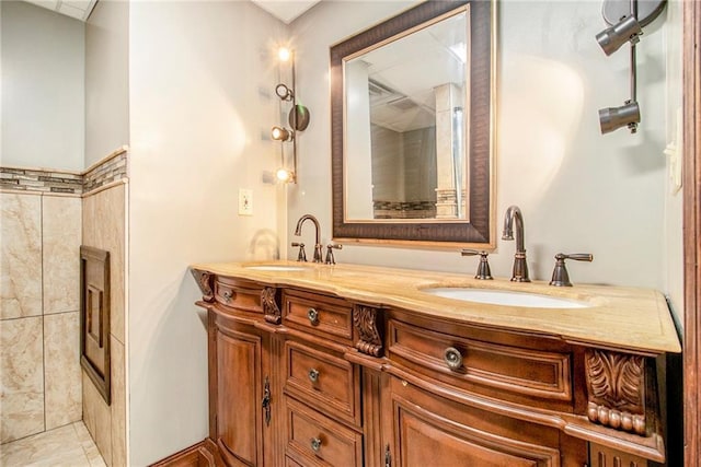 bathroom with double vanity and a sink