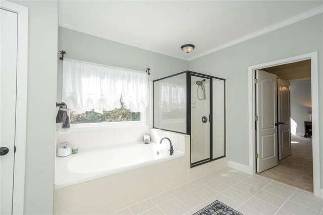 bathroom featuring tile patterned flooring, ornamental molding, and plus walk in shower