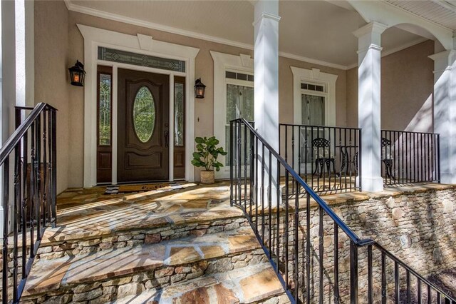 entrance to property with covered porch