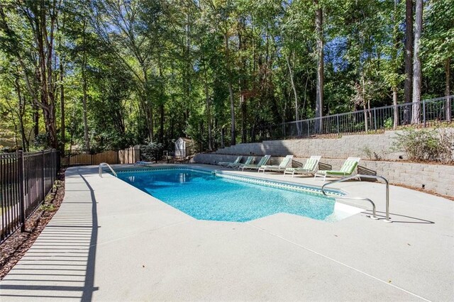 view of pool with a patio area