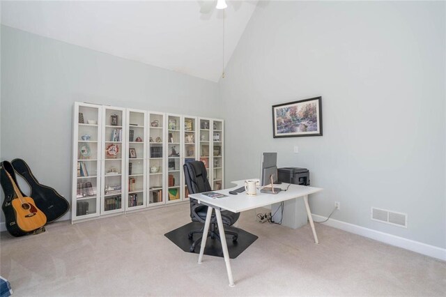 carpeted office with high vaulted ceiling