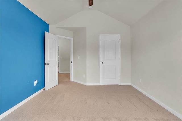 1354 Slate Bend Dr, Dacula, GA 30019 - unfurnished bedroom featuring light carpet, vaulted ceiling, and ceiling fan