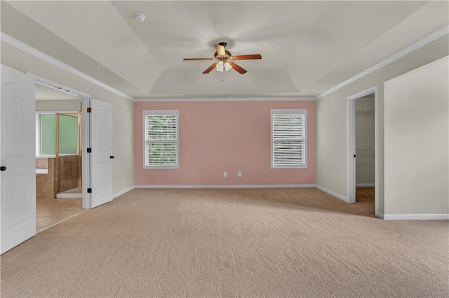 1354 Slate Bend Dr, Dacula, GA 30019 - unfurnished bedroom with a walk in closet, ceiling fan, light carpet, and a tray ceiling