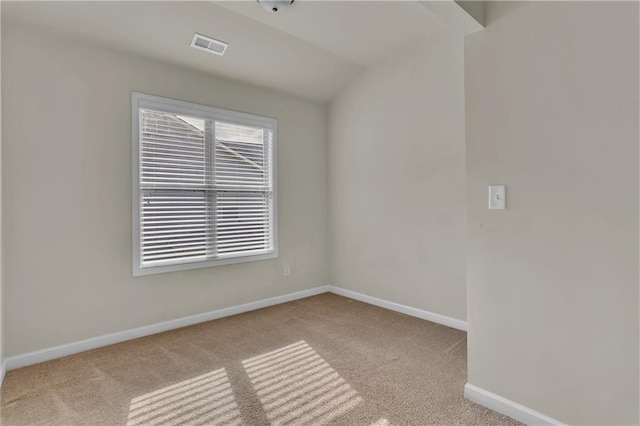 1354 Slate Bend Dr, Dacula, GA 30019 - spare room with light carpet and lofted ceiling