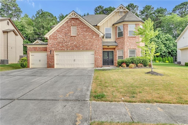 1354 Slate Bend Dr, Dacula, GA 30019 - view of front of property featuring a garage, central air condition unit, and a front lawn