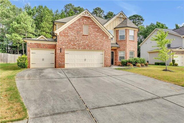 1354 Slate Bend Dr, Dacula, GA 30019 - view of front property featuring a garage and a front lawn