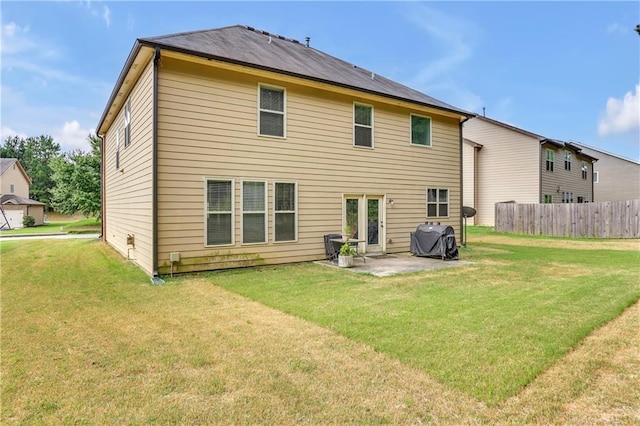 1354 Slate Bend Dr, Dacula, GA 30019 - back of property with a yard and a patio